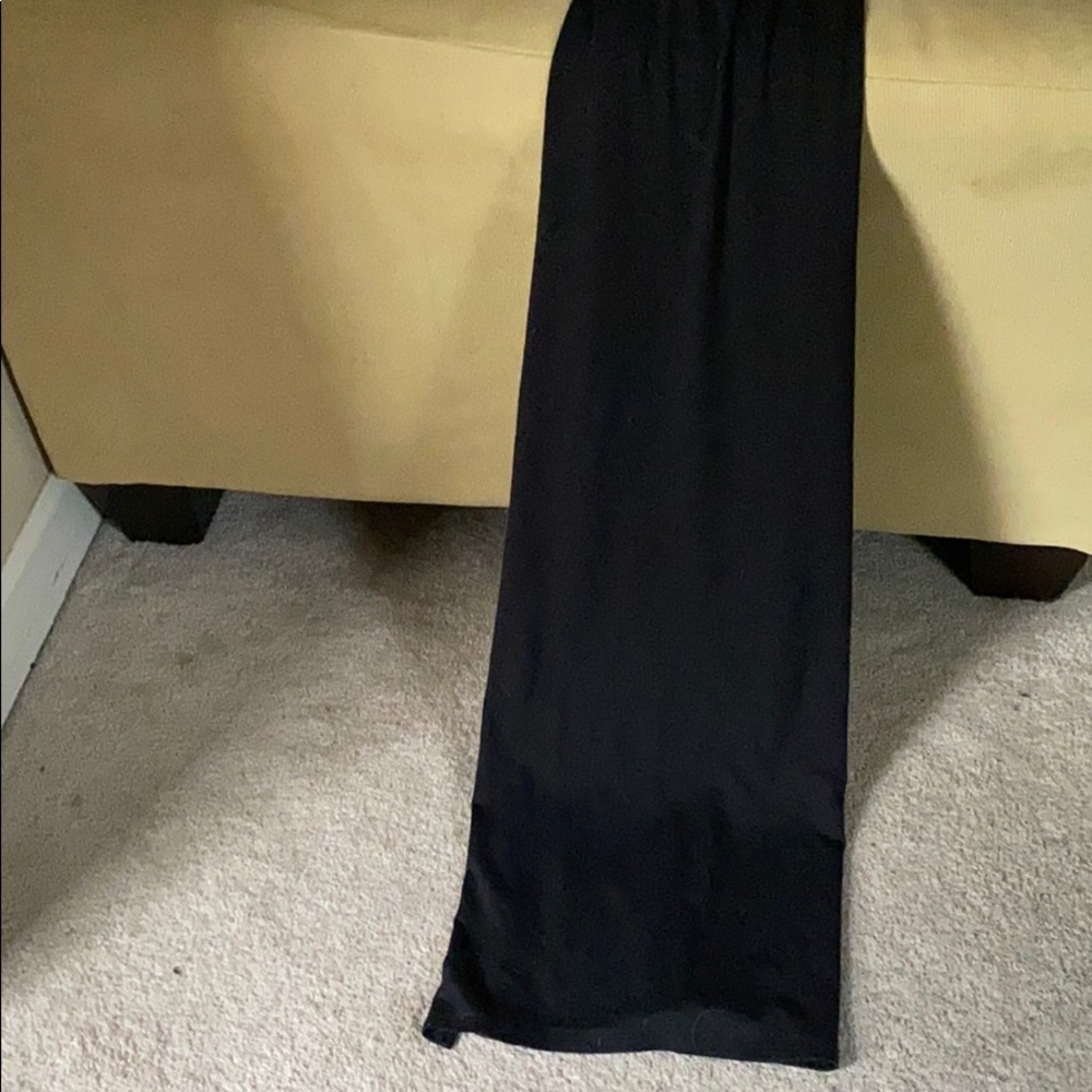 Black maxi skirt with slits on both sides.